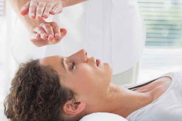 Woman receiving reiki